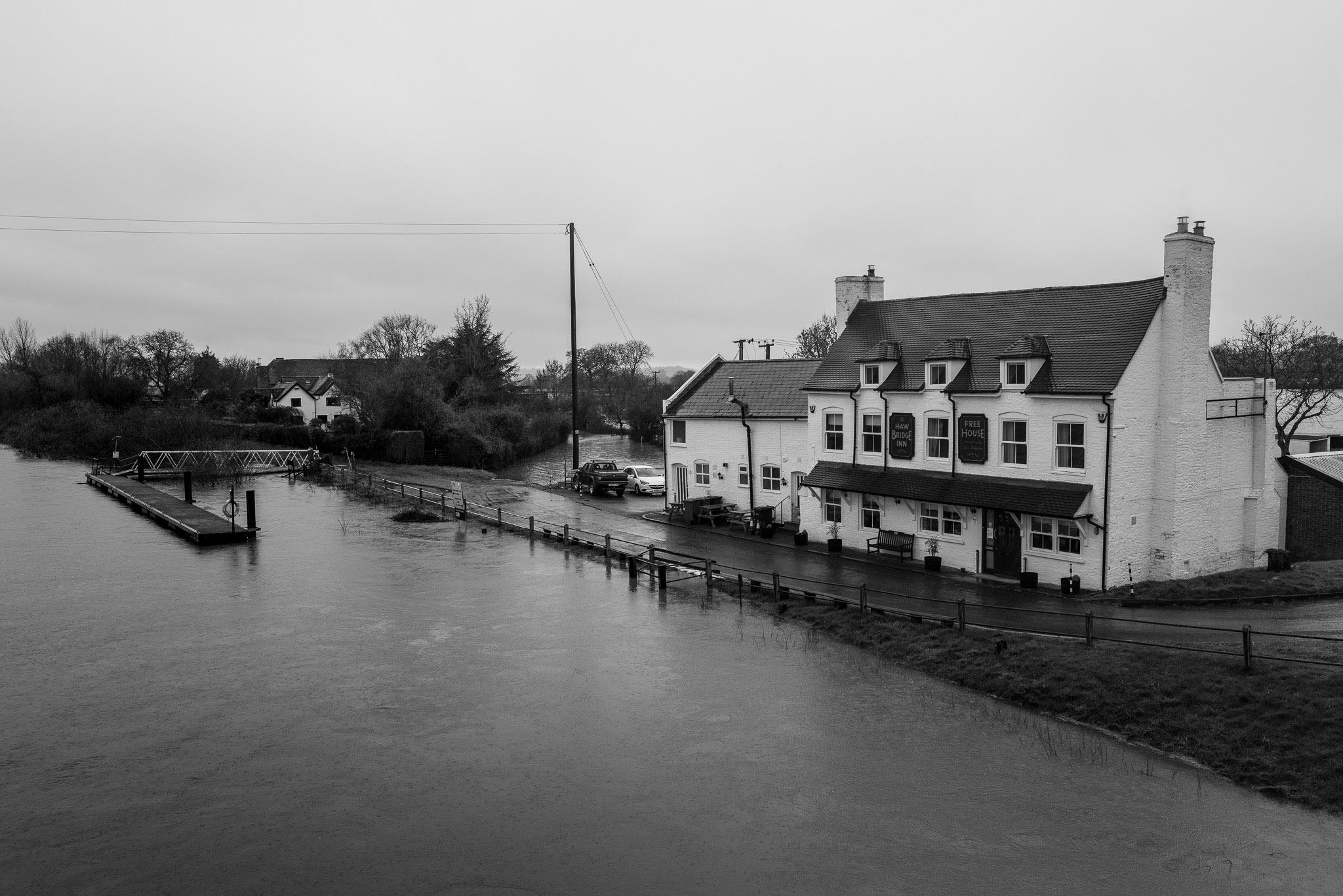 The Haw Bridge Inn with high water in the River Severn